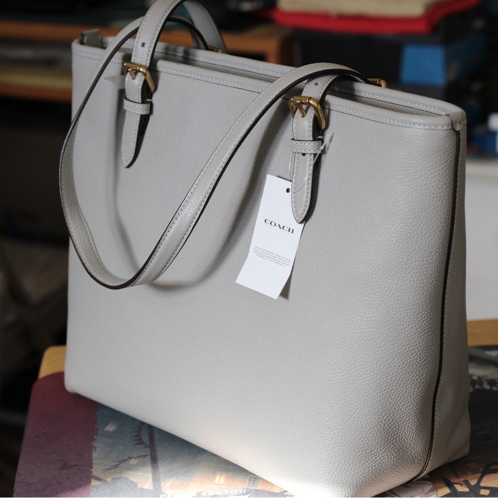Coach women’s pebble leather Taylor medium tote